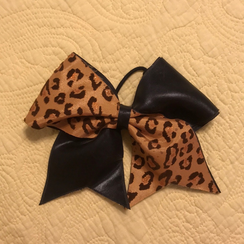 Leather cheetah print cheer bow